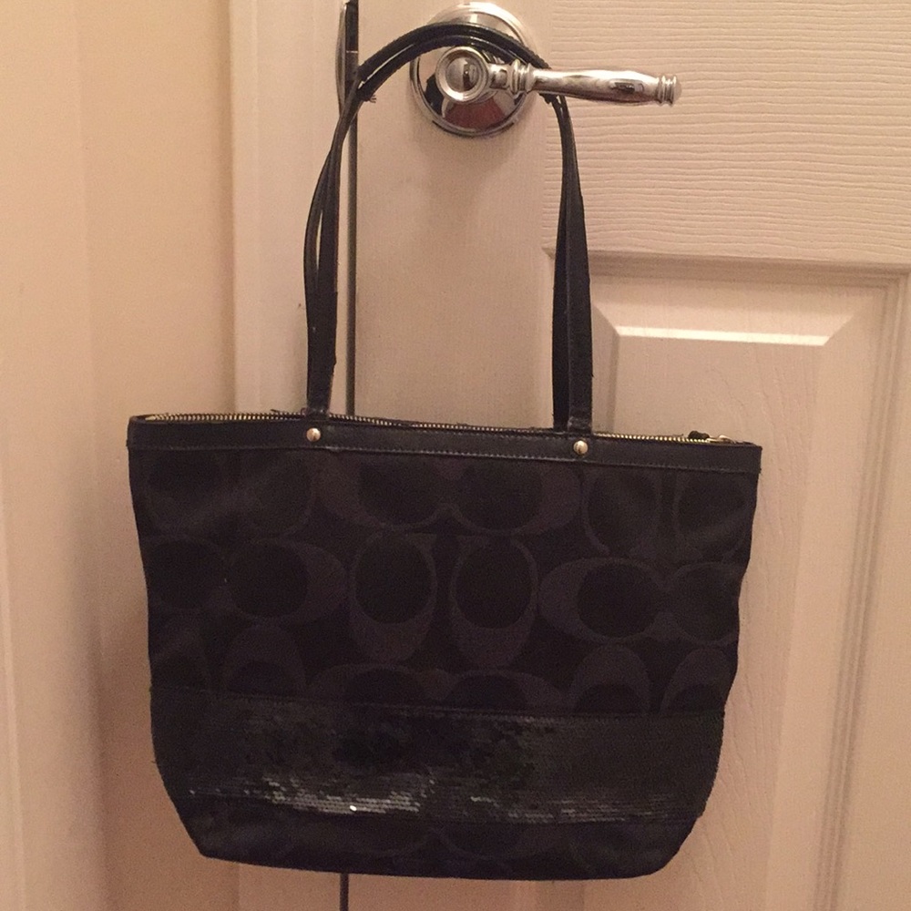 Coach H1120-F17574 in black with sequence strip